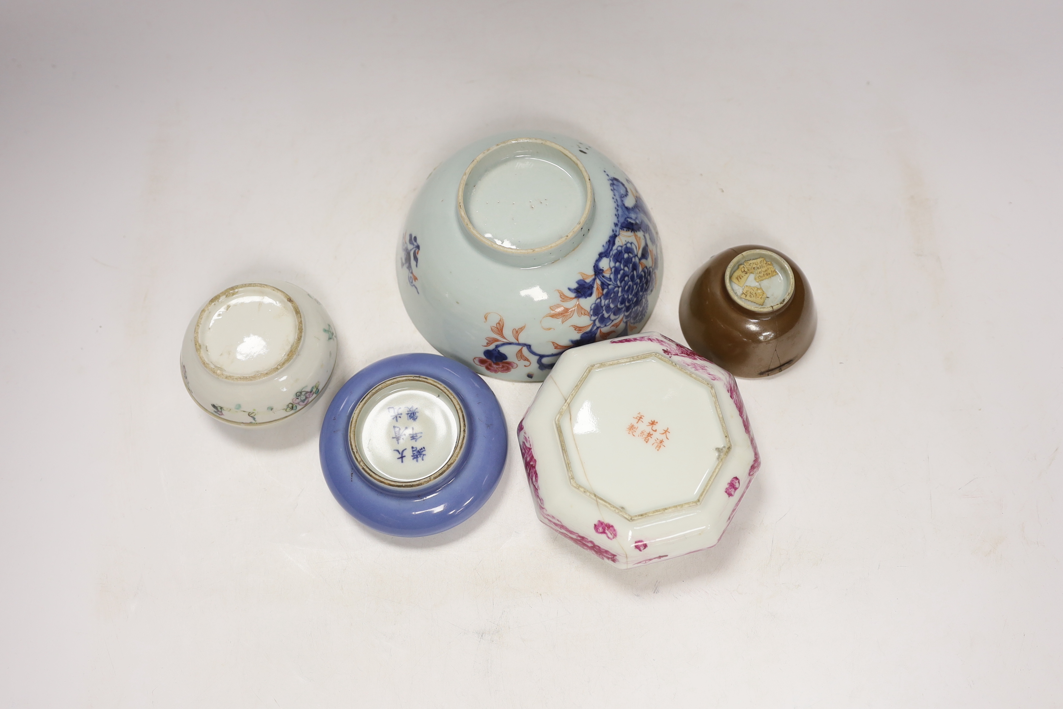 A Chinese Clare de lune glazed brushwasher, a famille rose box and cover, an octagonal puce enamelled brushwasher, an 18th century bowl and teabowl, largest 15cm in diameter (5)